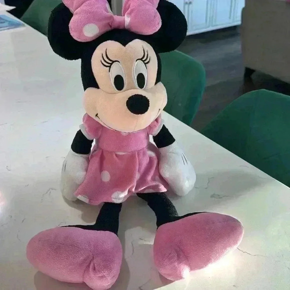 Disney Other - 18” Minnie Mouse Plush.  Great used condition. We’ve outgrown it!